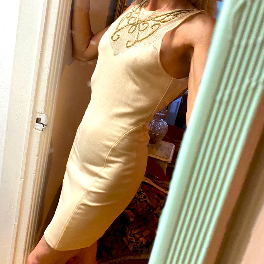 Gorgeous fitted light peach cocktail mini dress with gold embossed trim